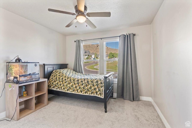 1608 S Terrace Rd, Saratoga Springs, UT 84045 - bedroom with light carpet, ceiling fan, and a textured ceiling