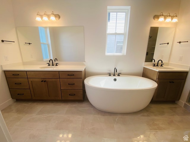 6511 W Lake Ave, South Jordan, UT 84009 - full bath featuring a soaking tub and two vanities