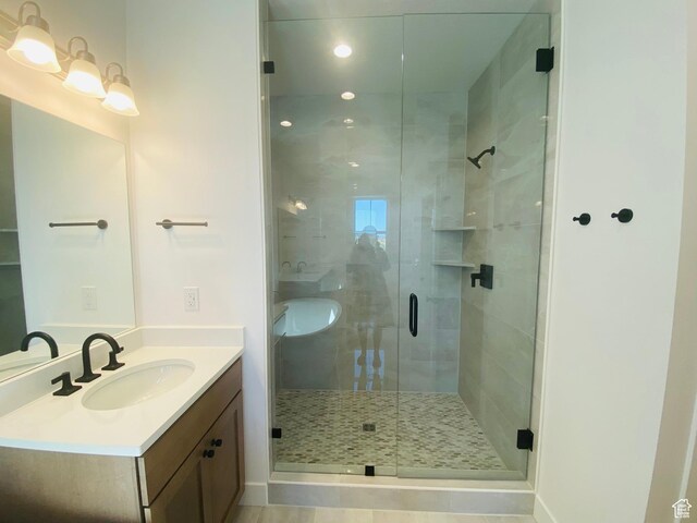 6511 W Lake Ave, South Jordan, UT 84009 - full bathroom with vanity, a stall shower, and recessed lighting