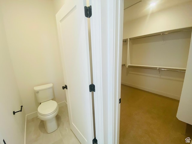 6511 W Lake Ave, South Jordan, UT 84009 - bathroom with toilet and a walk in closet