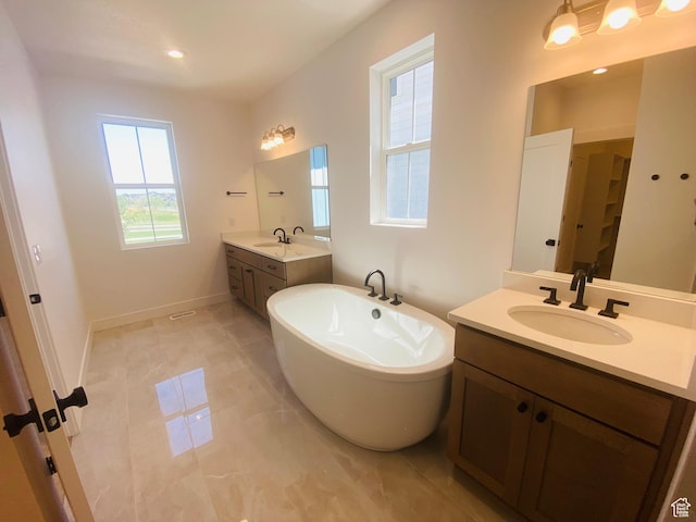 6511 W Lake Ave, South Jordan, UT 84009 - full bath with two vanities and a soaking tub