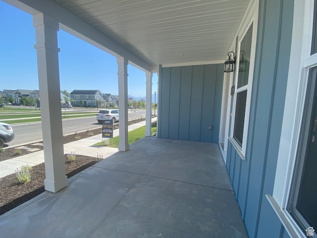 6511 W Lake Ave, South Jordan, UT 84009 - covered porch featuring a residential view