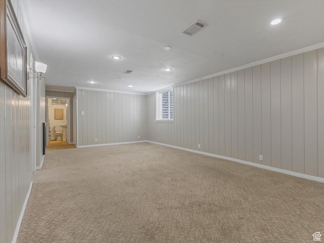 2848 E Loran Heights Dr, Millcreek, UT 84109 - spare room featuring ornamental molding, light colored carpet, recessed lighting, and wood walls