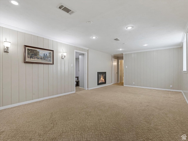 2848 E Loran Heights Dr, Millcreek, UT 84109 - below grade area with ornamental molding, recessed lighting, light carpet, and a glass covered fireplace