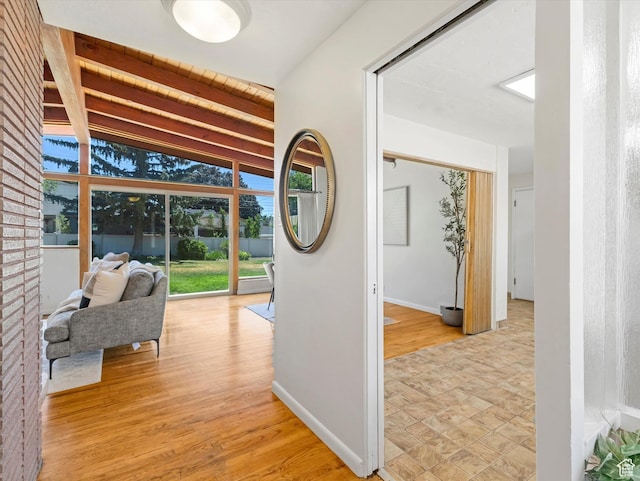 2848 E Loran Heights Dr, Millcreek, UT 84109 - hallway with light wood-style flooring and baseboards