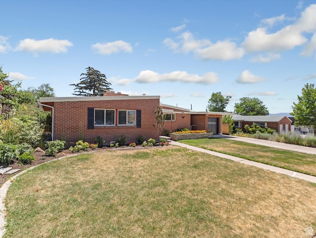 2848 E Loran Heights Dr, Millcreek, UT 84109 - ranch-style house featuring an attached garage, brick siding, concrete driveway, and a front lawn