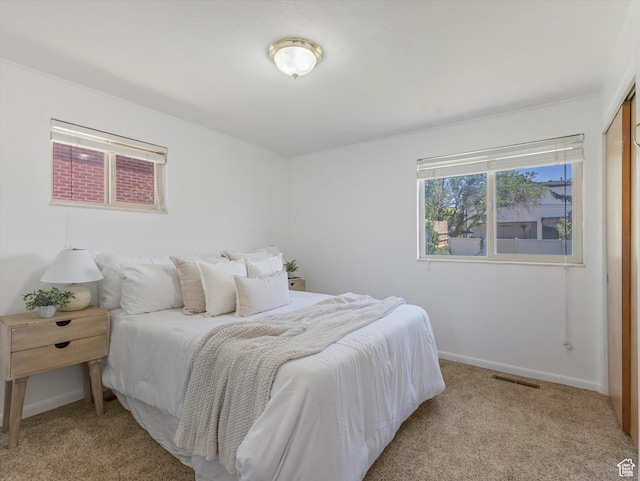 2848 E Loran Heights Dr, Millcreek, UT 84109 - carpeted bedroom with baseboards and a closet