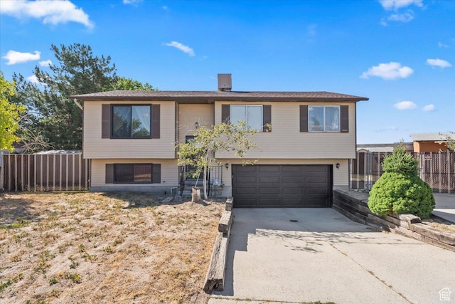5987 S Salem Cir, Salt Lake City, UT 84118 - raised ranch with a garage and driveway
