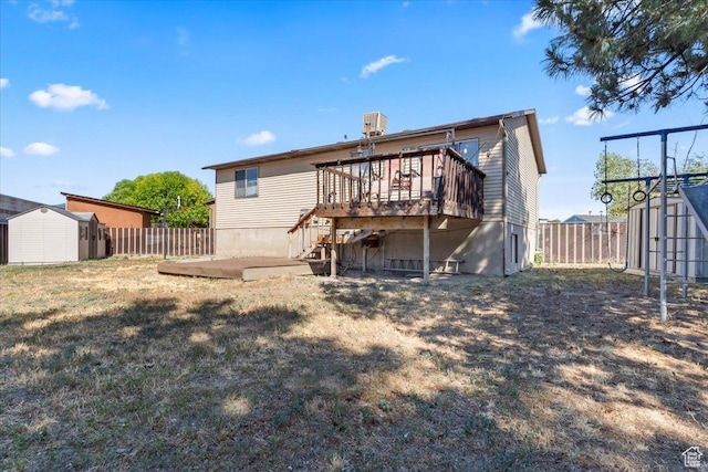 5987 S Salem Cir, Salt Lake City, UT 84118 - back of house featuring a shed, a fenced backyard, a deck, and a patio area