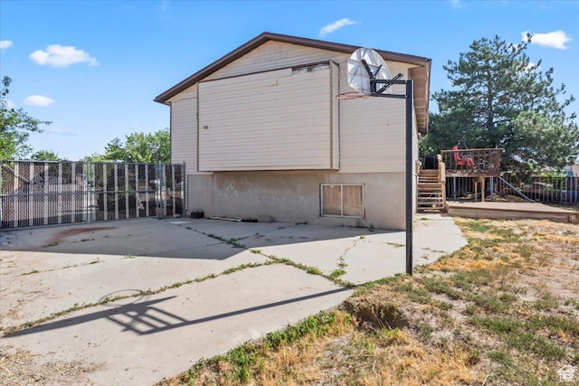 5987 S Salem Cir, Salt Lake City, UT 84118 - view of home's exterior with stairs, a wooden deck, and a patio