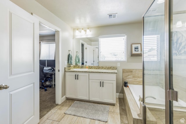 150 N 1100 E Unit 63, Washington, UT 84780 - full bath featuring vanity, a bath, and a shower with door