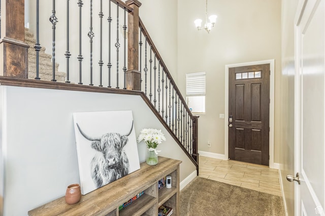 150 N 1100 E Unit 63, Washington, UT 84780 - foyer entrance featuring stairs, a chandelier, and a high ceiling