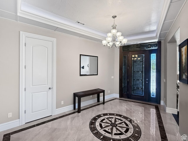 1645 E 6800 S, Uintah, UT 84405 - entrance foyer featuring inlaid floor details, a chandelier, ornamental molding, marble finish floors, and a tray ceiling
