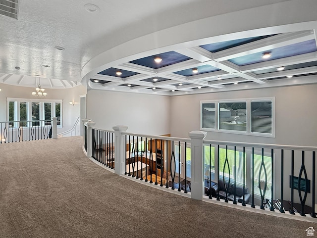 1645 E 6800 S, Uintah, UT 84405 - corridor featuring carpet, a chandelier, coffered ceiling, beam ceiling, and an upstairs landing
