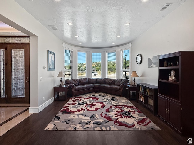 1645 E 6800 S, Uintah, UT 84405 - living room with wood finished floors, a textured ceiling, and recessed lighting