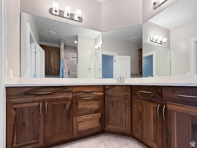 1645 E 6800 S, Uintah, UT 84405 - full bath featuring double vanity, a tile shower, and marble finish floors