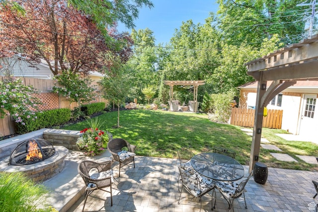 1120 E Yale Ave, Salt Lake City, UT 84105 - fenced backyard with an outdoor fire pit, a pergola, and a patio