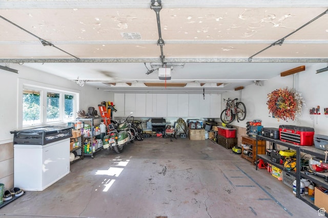 1120 E Yale Ave, Salt Lake City, UT 84105 - garage featuring a garage door opener