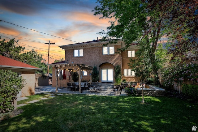 1120 E Yale Ave, Salt Lake City, UT 84105 - back of house featuring french doors, a pergola, a patio, and stucco siding