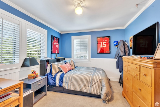 1120 E Yale Ave, Salt Lake City, UT 84105 - bedroom featuring multiple windows, a wainscoted wall, ornamental molding, and light carpet