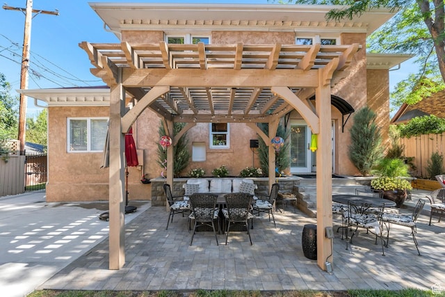 1120 E Yale Ave, Salt Lake City, UT 84105 - view of patio with outdoor dining area and a pergola