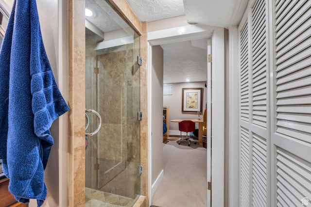 1120 E Yale Ave, Salt Lake City, UT 84105 - bathroom with a shower stall, a closet, and a textured ceiling