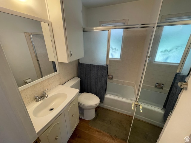 948 E 150 N, Provo, UT 84606 - bathroom with vanity, wood finished floors, healthy amount of natural light, and shower / bath combination with glass door
