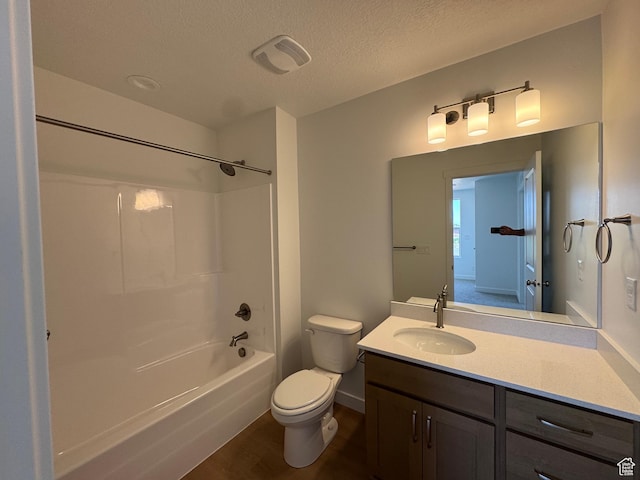 1464 N 1875 W Unit 149, Layton, UT 84041 - bathroom with vanity, wood finished floors, bathtub / shower combination, and a textured ceiling