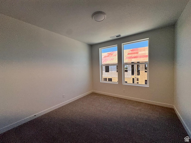 1464 N 1875 W Unit 149, Layton, UT 84041 - spare room with baseboards and dark colored carpet