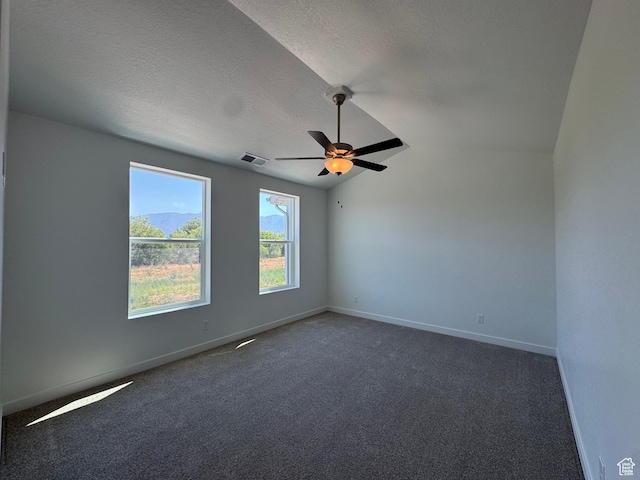 1464 N 1875 W Unit 149, Layton, UT 84041 - unfurnished room with ceiling fan, carpet flooring, a textured ceiling, and vaulted ceiling