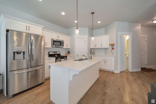 3781 W 2330 N, Lehi, UT 84043 - kitchen featuring stainless steel appliances, light wood-style floors, white cabinetry, light countertops, and an island with sink