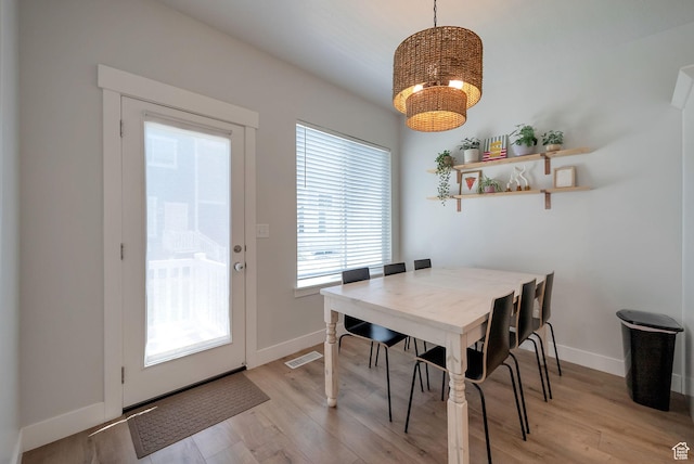 3781 W 2330 N, Lehi, UT 84043 - dining room featuring a chandelier and light wood-style flooring