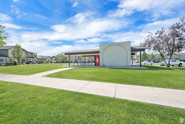 1568 N 565 W Unit 104, Logan, UT 84341 - view of property's community with a residential view and a lawn