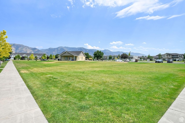 1568 N 565 W Unit 104, Logan, UT 84341 - view of home's community with a mountain view, a residential view, and a yard