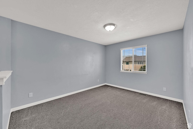 1568 N 565 W Unit 104, Logan, UT 84341 - carpeted empty room with baseboards and a textured ceiling