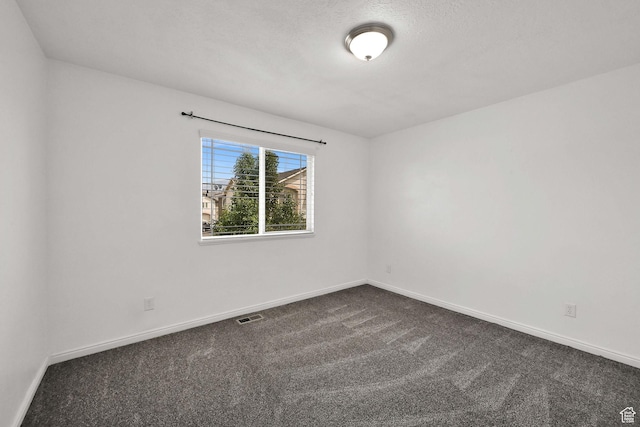 1568 N 565 W Unit 104, Logan, UT 84341 - unfurnished room featuring dark colored carpet