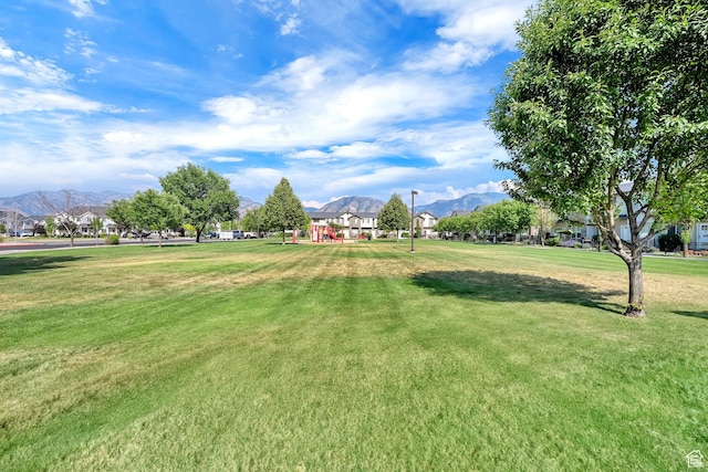 1568 N 565 W Unit 104, Logan, UT 84341 - view of home's community with a mountain view and a yard