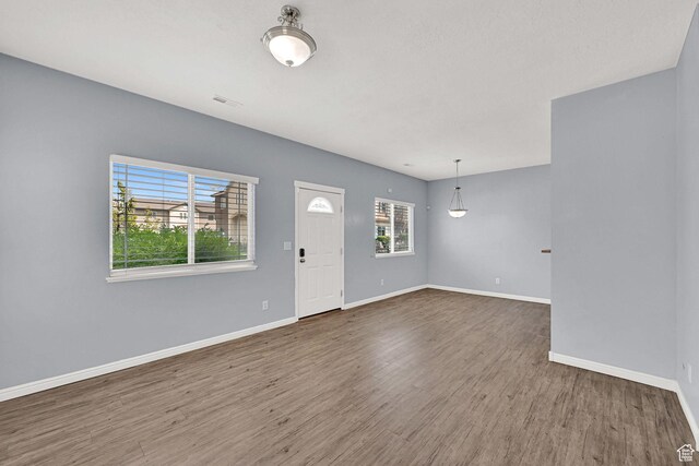 1568 N 565 W Unit 104, Logan, UT 84341 - entryway with baseboards and wood finished floors
