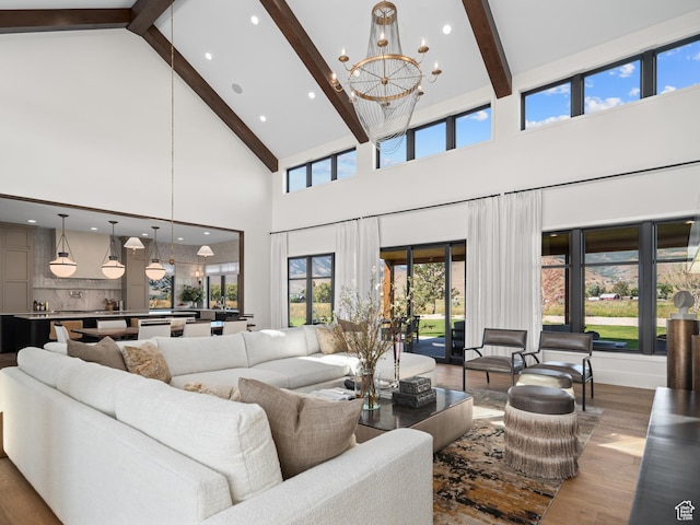 322 S 7900th St E Unit 5, Huntsville, UT 84317 - living area featuring high vaulted ceiling, beam ceiling, a chandelier, wood finished floors, and recessed lighting