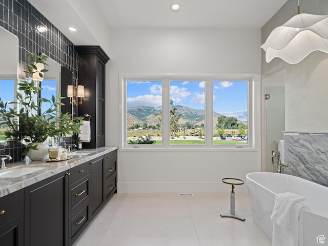 322 S 7900th St E Unit 5, Huntsville, UT 84317 - bathroom with double vanity, a soaking tub, plenty of natural light, tile patterned floors, and recessed lighting