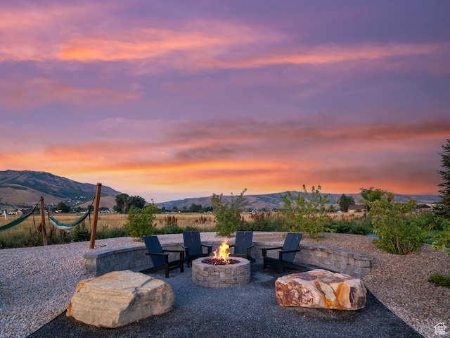 322 S 7900th St E Unit 5, Huntsville, UT 84317 - view of patio / terrace featuring a fire pit and a mountain view