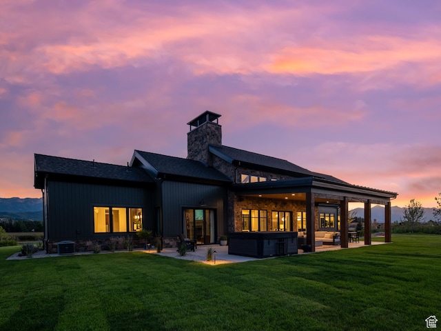 322 S 7900th St E Unit 5, Huntsville, UT 84317 - rear view of property with a hot tub, a patio, a lawn, a chimney, and an outdoor living space