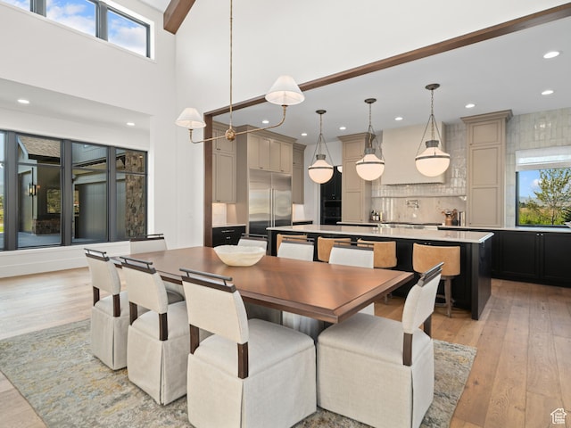 322 S 7900th St E Unit 5, Huntsville, UT 84317 - dining room with plenty of natural light, light wood-type flooring, recessed lighting, and a high ceiling
