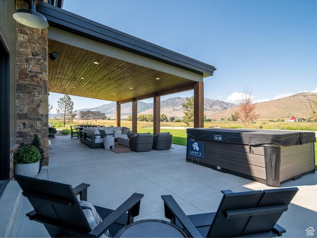 322 S 7900th St E Unit 5, Huntsville, UT 84317 - view of patio / terrace featuring a mountain view, outdoor lounge area, and a hot tub
