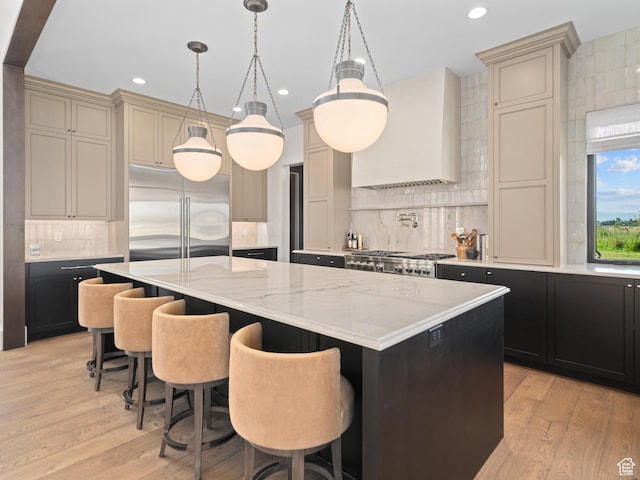322 S 7900th St E Unit 5, Huntsville, UT 84317 - kitchen with built in fridge, backsplash, a kitchen island, recessed lighting, and light wood finished floors