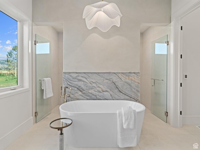 322 S 7900th St E Unit 5, Huntsville, UT 84317 - bathroom with tile walls, a stall shower, tile patterned floors, and a soaking tub