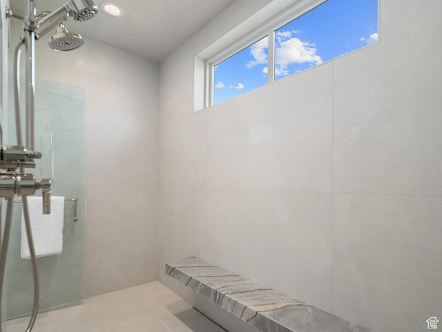322 S 7900th St E Unit 5, Huntsville, UT 84317 - bathroom featuring tiled shower, tile patterned flooring, and tile walls