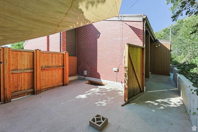 3574 E Kings Cove Way, Cottonwood Heights, UT 84121 - view of patio / terrace featuring a gate