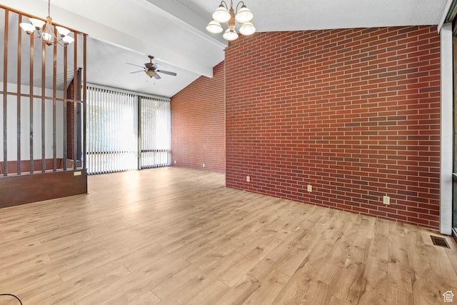 3574 E Kings Cove Way, Cottonwood Heights, UT 84121 - unfurnished living room with a chandelier, brick wall, wood finished floors, and ceiling fan