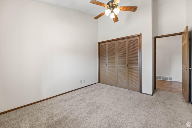 3574 E Kings Cove Way, Cottonwood Heights, UT 84121 - unfurnished bedroom with carpet, a high ceiling, a closet, and ceiling fan